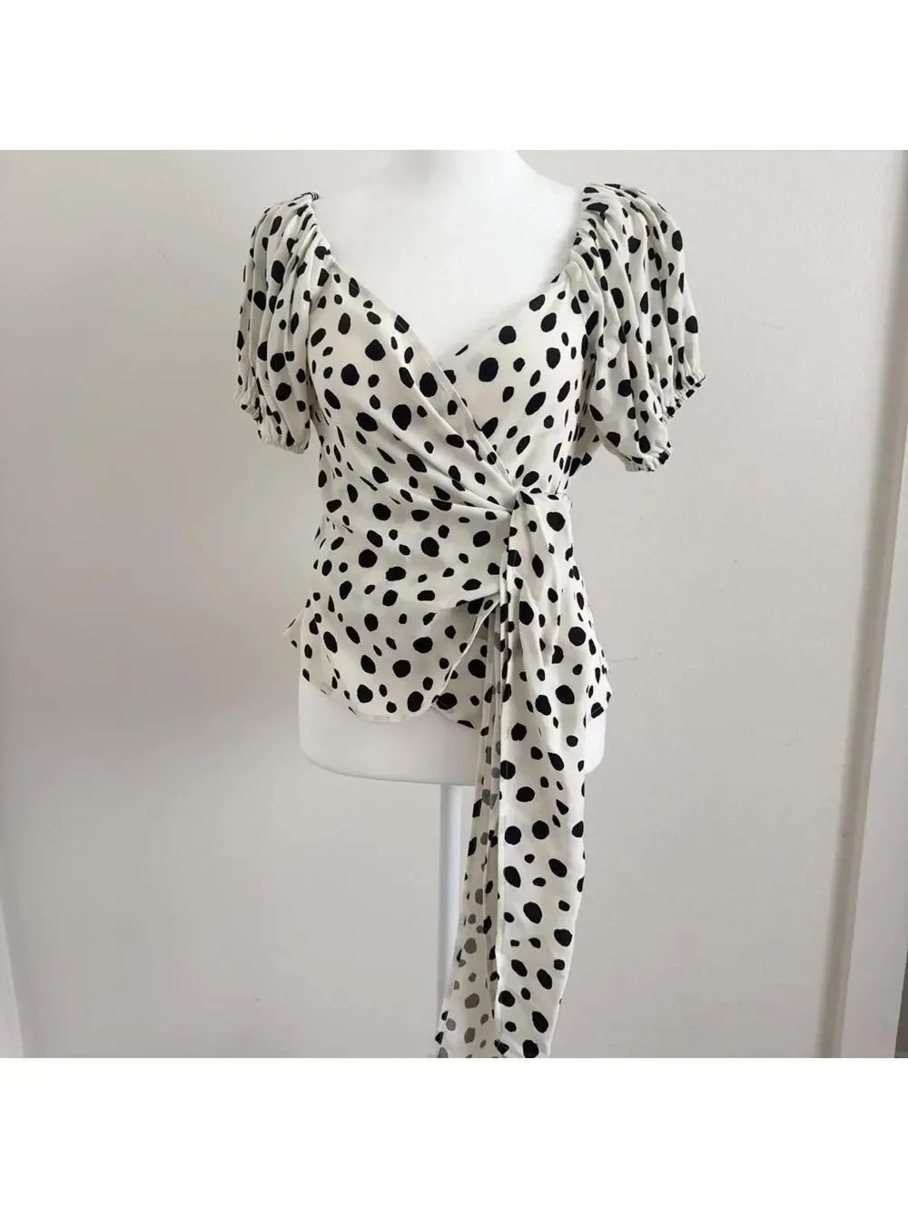 Reformation Lores Off The Shoulder Puff Sleeve Wrap Top in polkadot